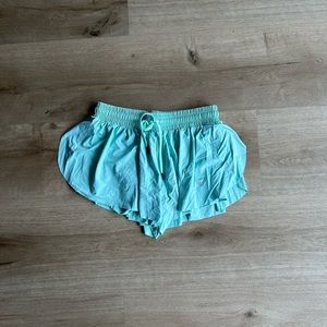 Flowy shorts with sewn in spandex